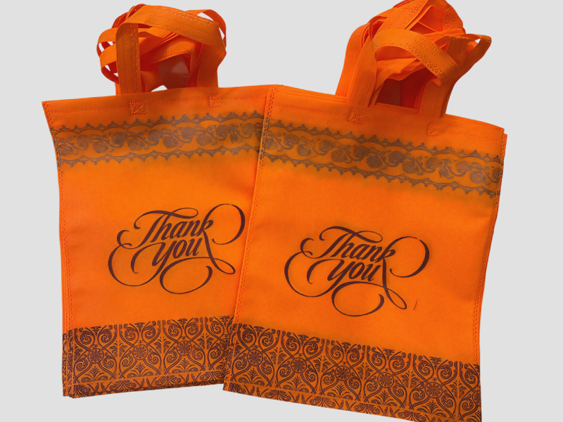 Orange Ethnic Border Print Thank You Non Woven Loop Handle Bag