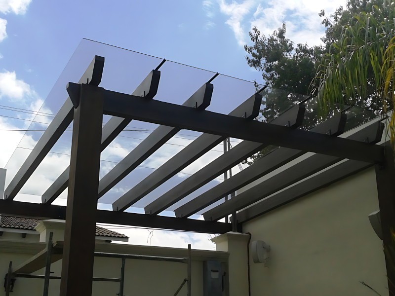 Architectural Glass Canopy Installation System for Building Entrances