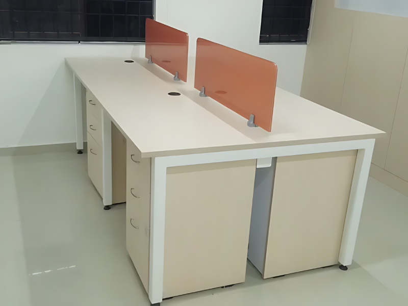 Double-sided office desk for shared work environments