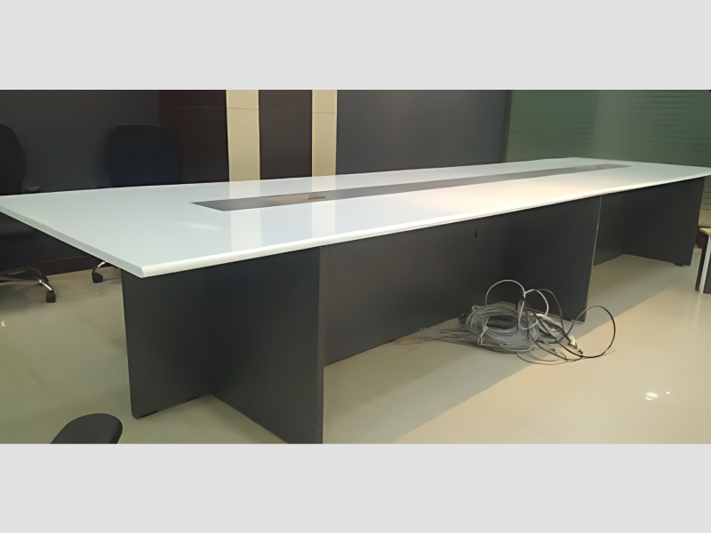 Panel base conference table for professional office spaces