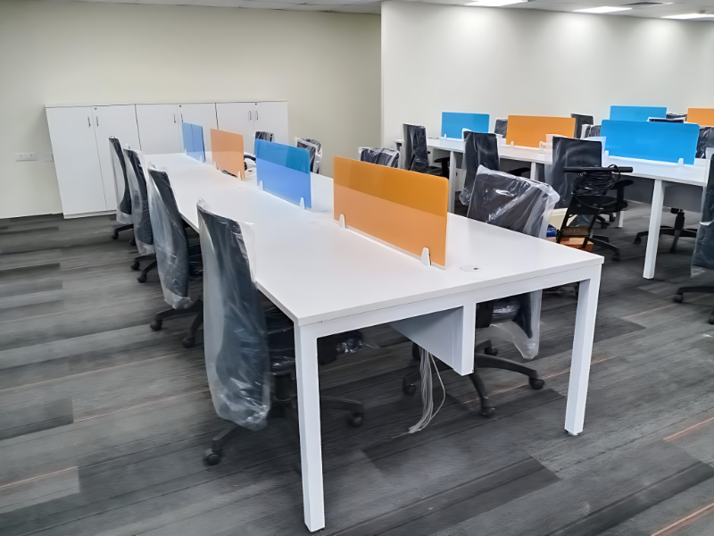 Contemporary Open Office Workstation With Glass Dividers And Ergonomic Seating Arrangement