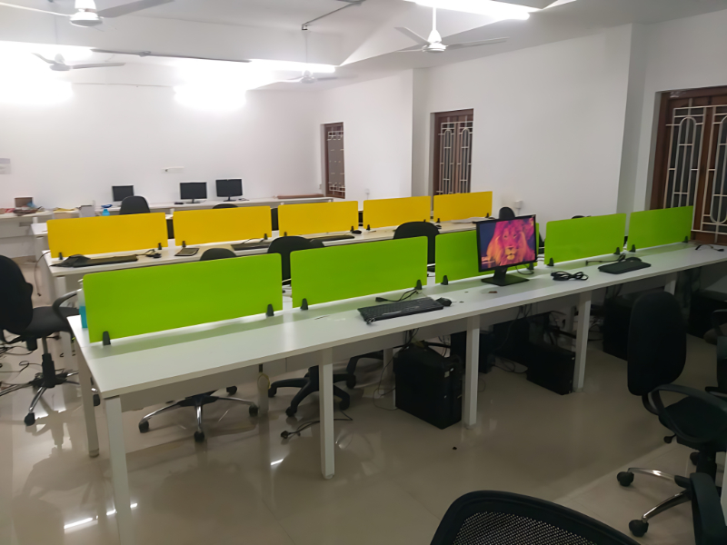 Open Office Workstation Cluster With Glass Partition Panels And Mobile Storage Units