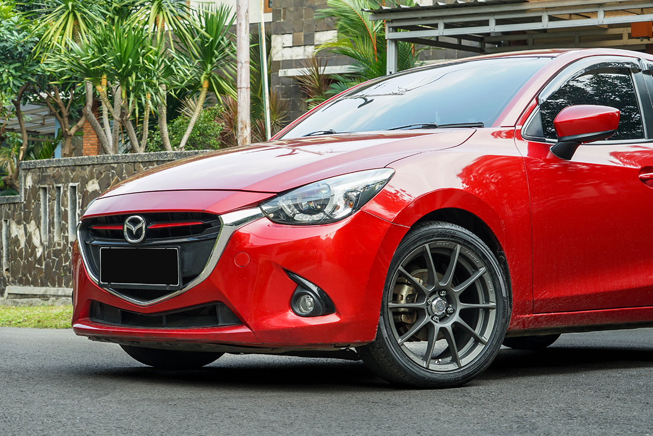 Permaisuri Enkei Tuning SC33 on Mazda 2