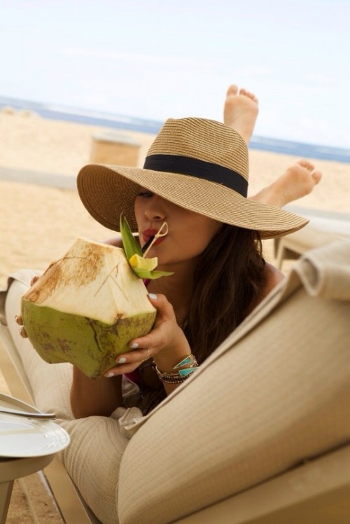 Looking for a similar wide rimmed beige colour hat that Shay Mitchell is wearing - SeenIt