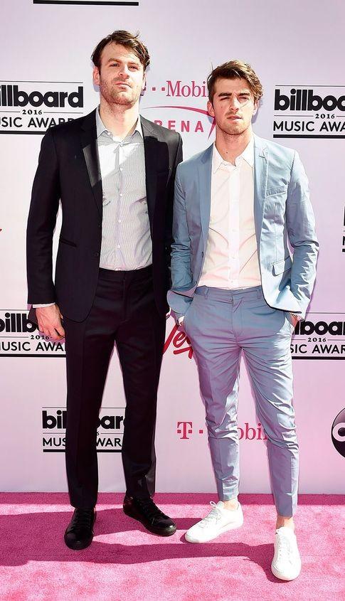 white sneakers blue suit