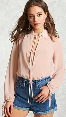 Help me find a similar peach top with blue denim shorts - SeenIt