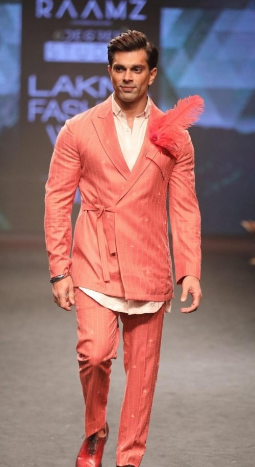 Yay or Nay? Karan Singh Grover walks the ramp in this orange wrap blazer and pants coords at Lakme Fashion Week 2018 - SeenIt