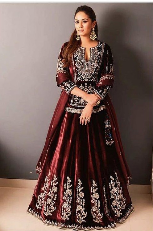 Yay or Nay? Mira Rajput wearing a maroon velvet Anita Dongre lehenga at Isha Ambani’s wedding in Mumbai - SeenIt