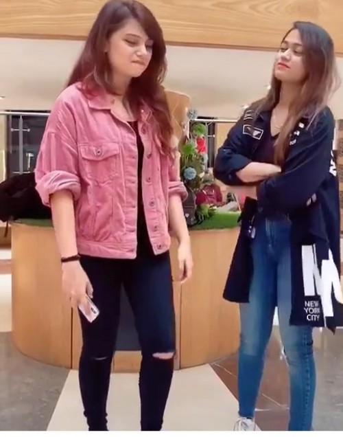 pink blazer black jeans