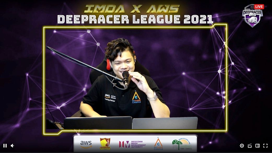 Our MC hard at work during Day 1 of AWS Deepracer League