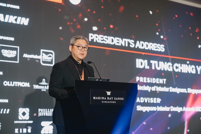 President of SIDS on stage giving speech in 2025