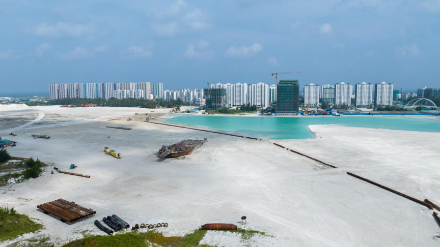 MACL completes Phase 3 dredging with barge in lagoon