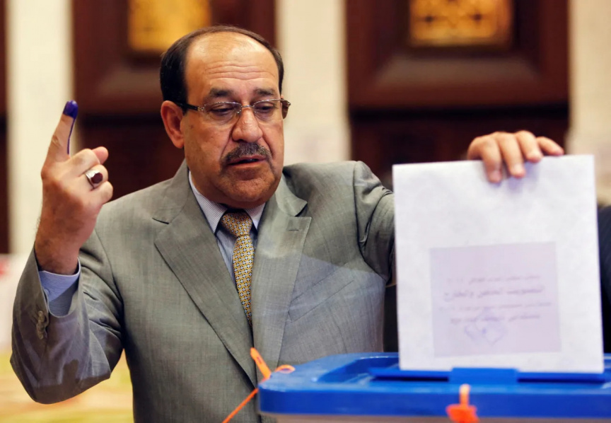 Iraq's largest political bloc backs Maliki