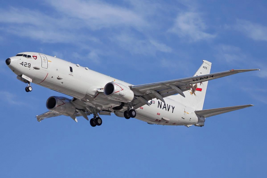 US aircraft flies over area where three went missing