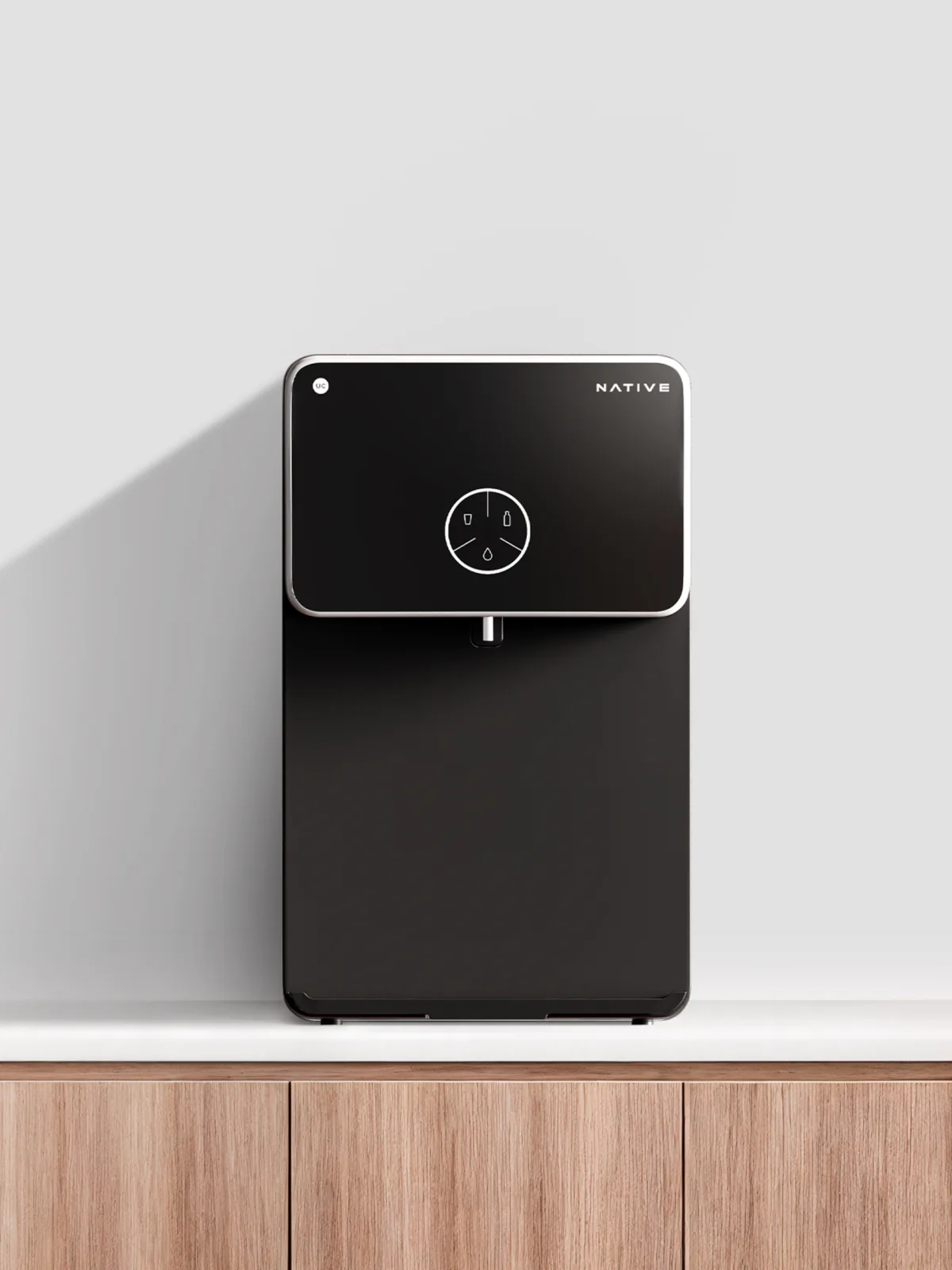 Native M2 Pro standing on a wooden kitchen counter.