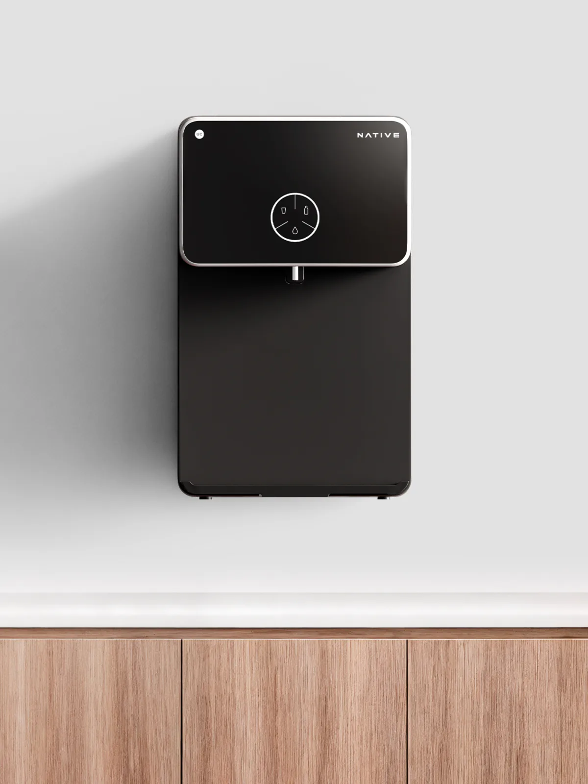 Native M2 Pro mounted on a white kitchen wall.