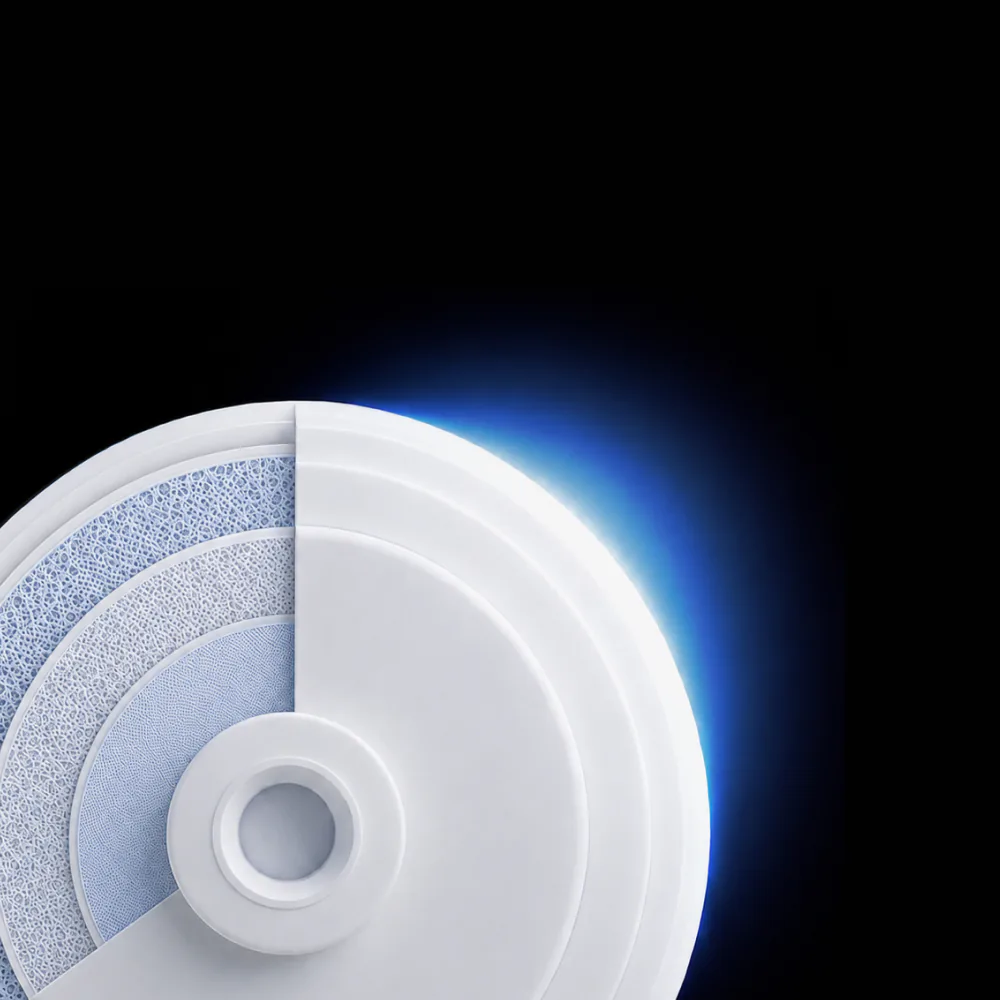Cutaway of the Native M3 MultiMicron™ filter, its layered filter media glowing blue at the edge.