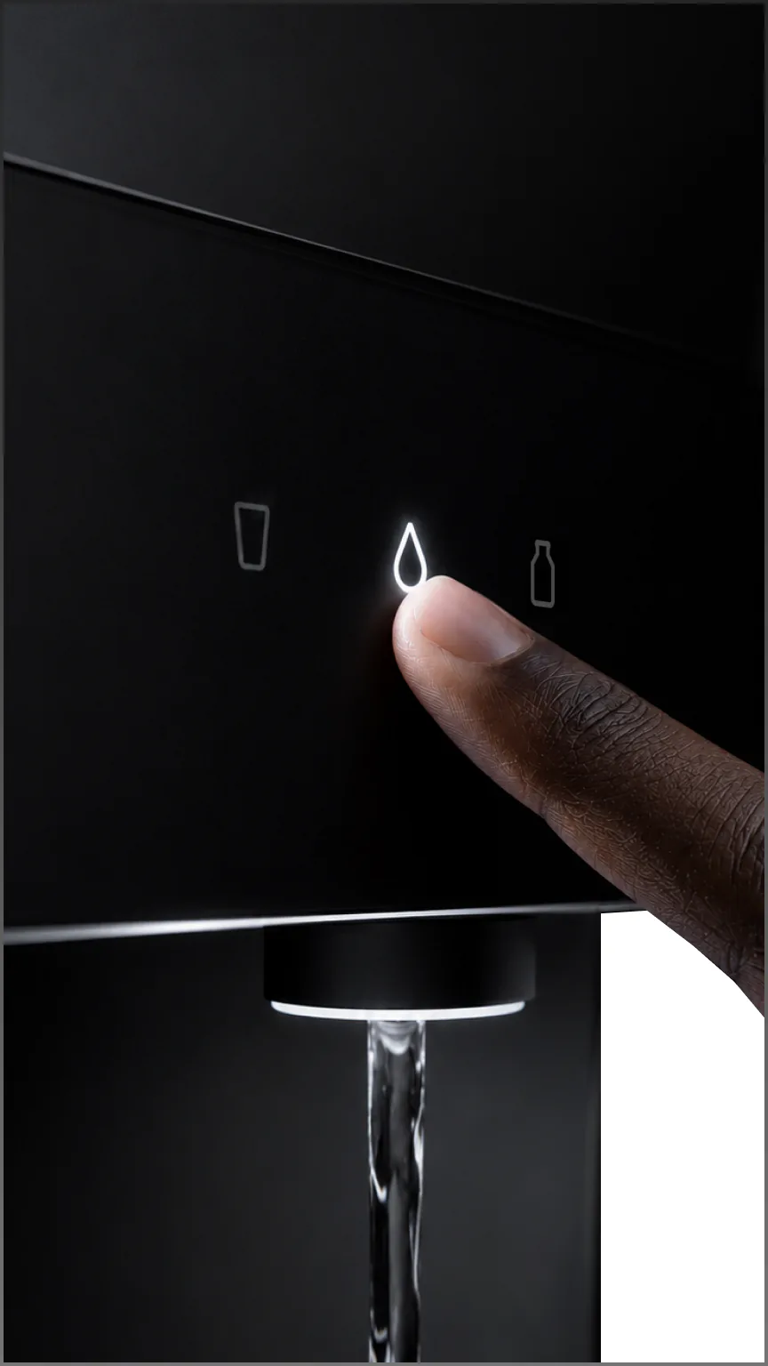 A finger tapping the water icon on the Native M3 as water pours.