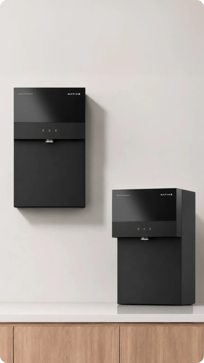 Two Native M3 purifiers, one mounted on the wall and one on the counter.