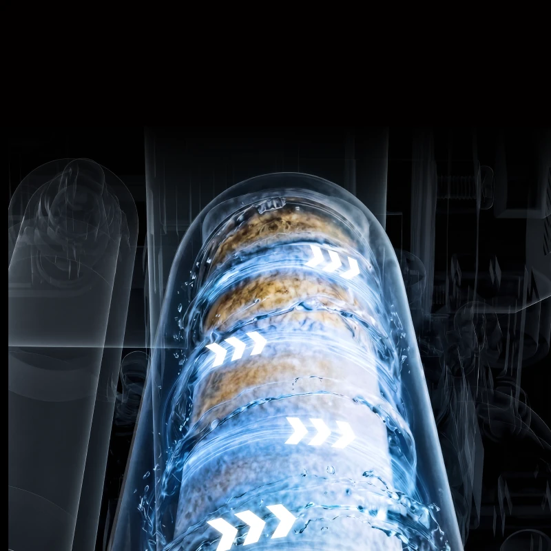 Smart Rinse™ Technology in the Native M3 Pro: water rushes along a transparent filter cartridge, washing deposits off the filter surface.