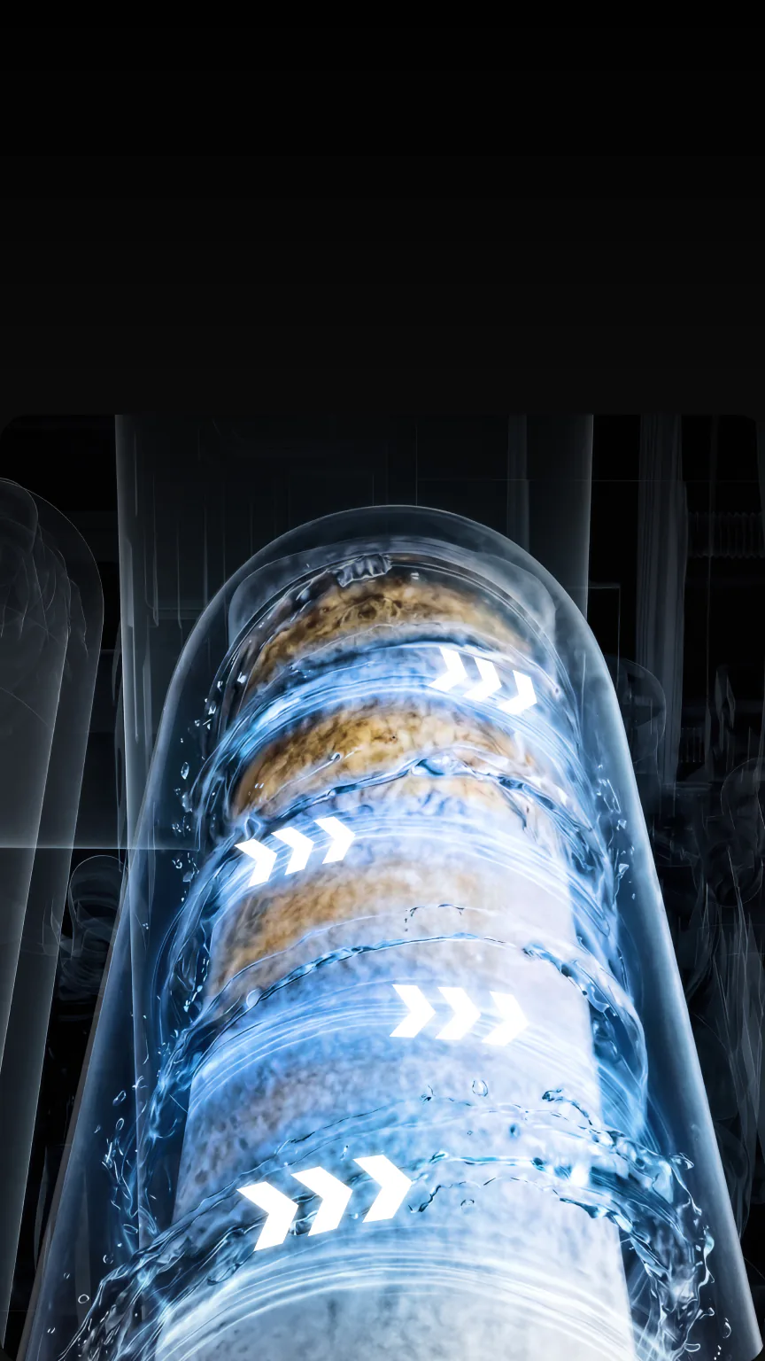 Cutaway of a filter cartridge with water flushing through it during Smart Rinse, in blue light.