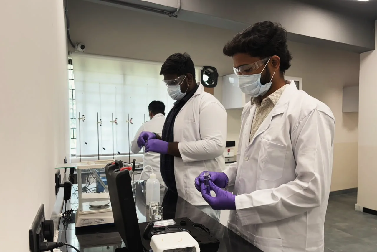 Testing water samples at the lab bench