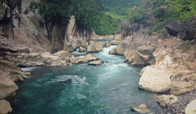 The clear blue waters of Tinipak River