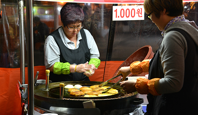 A vendor selling hotteok