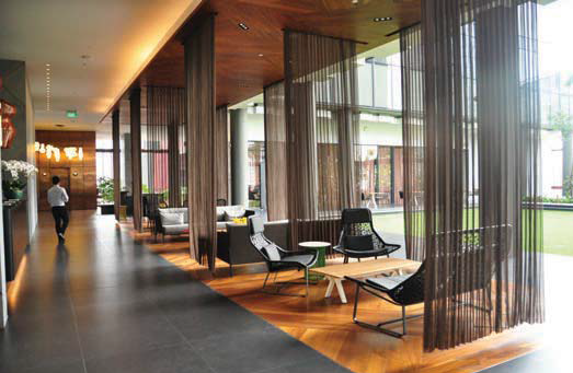 The hotel reception on the 12th floor, with a lounge overlooking the open-air sky garden. Source: Far East Organization